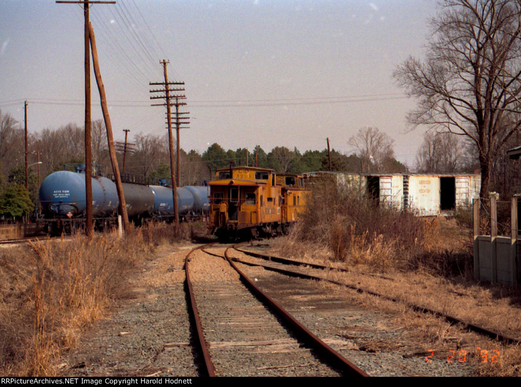 Boxcars and former Chessie System cabeese on the A&R track